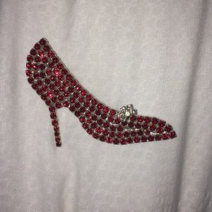 Hi heel brooch